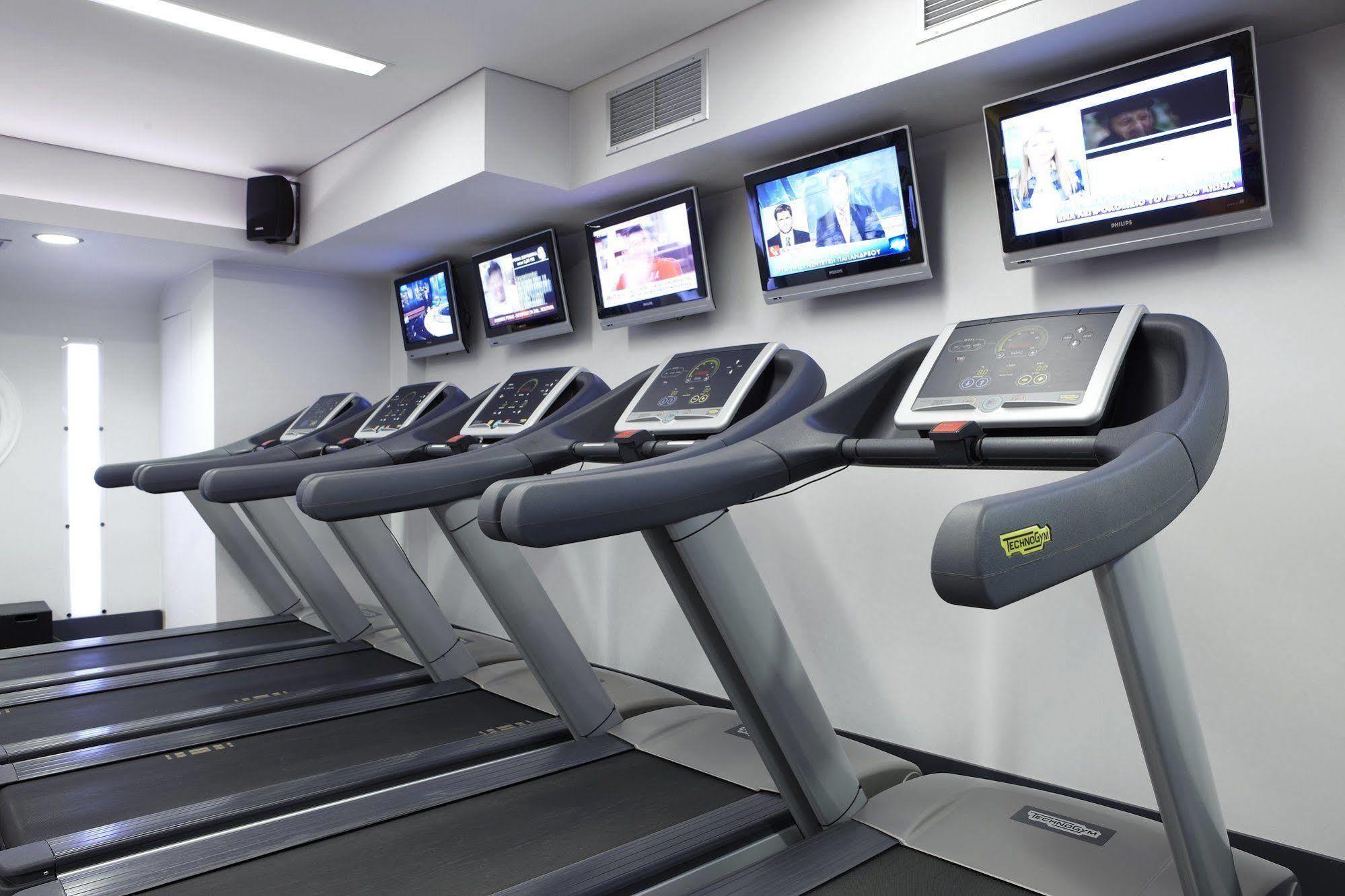 Limneon Resort & Spa Кастория Экстерьер фото A row of treadmills